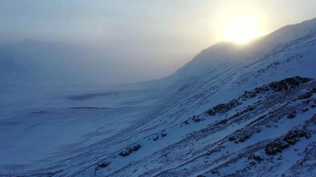 Drone Flight Over Snow Covered Tundra Landscape In Alaskas Gates Of The Arctic National Park