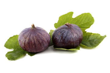 Two figs on leaves