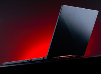 Gaming pc laptop on red background