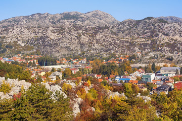 Fototapeta premium Sunny autumn, beautiful mountain landscape. Montenegro, view of ancient town of Cetinje