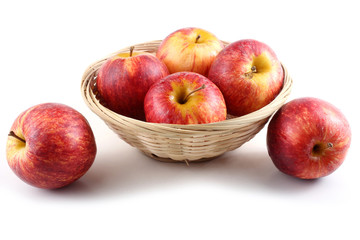 Fototapeta na wymiar Gala apples on wicker plate