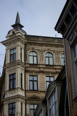 Fototapeta na wymiar Beautiful buildings in Riga, Latvia. Walking in Riga in March 2020