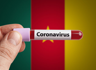 Scientist holding Coronavirus infected blood in test tube in front of Cameroon flag. Pandemic COVID-19 infection in countries in world concept.