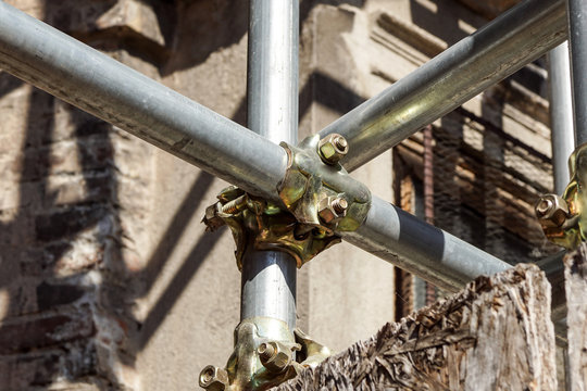 Scaffolding pipe clamp and parts, An important part of building strength to scaffold clamps in used close up on construction site,platforms for stage structure support