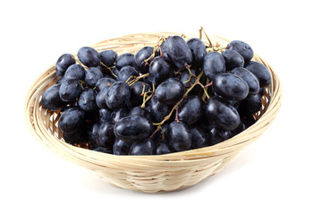 Grape on wicker plate