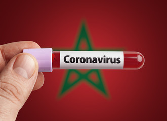 Scientist holding Coronavirus infected blood in test tube in front of Morocco flag. Pandemic COVID-19 infection in countries in world concept.