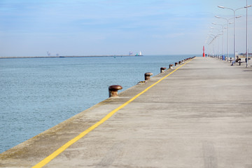 empty concrete floor of pier at port .
