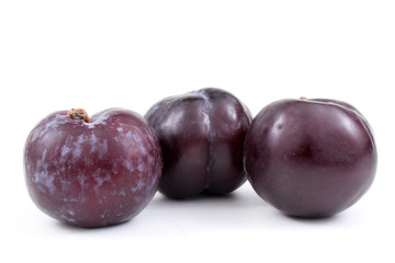 Three violet plums