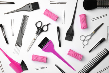 Professional tools for hair dyeing on white background, flat lay