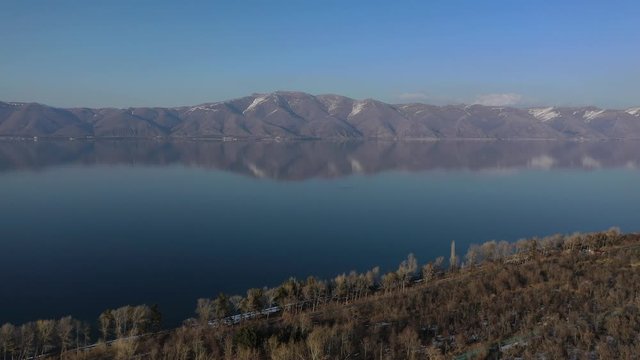 Picturesque shore of Lake Sevan in Armenia. Aerial view. Drone.