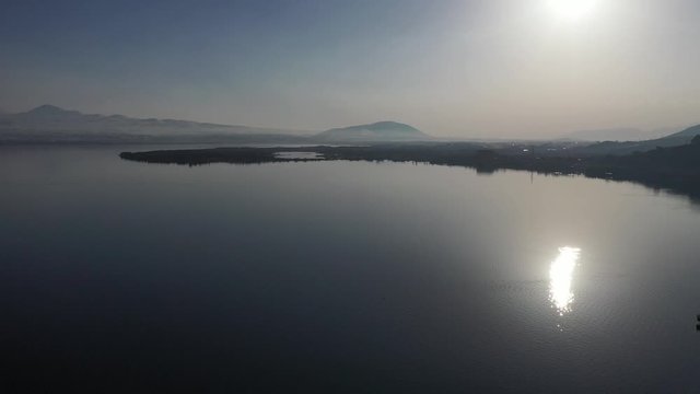Picturesque shore of Lake Sevan in Armenia. Aerial view. Drone.