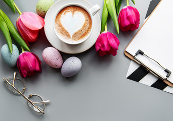 Cup of coffee and Easter eggs