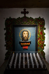 Christian wooden sculpture candle holder