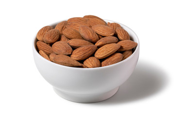 Peeled almonds in a white bowl, isolated on a white background. Image