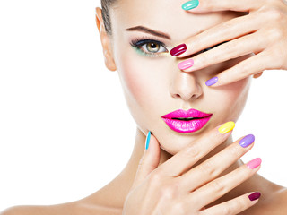 beautiful woman  with colored nails - obrazy, fototapety, plakaty