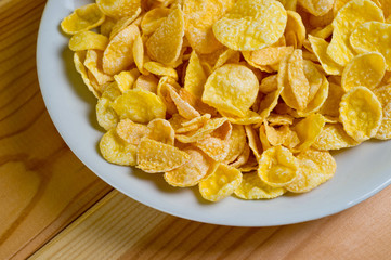 Glazed cornflakes. Breakfast cereals. Background for healthy eating and vegetarianism.