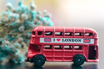 Red color vintage London Bus metal Toy closeup view