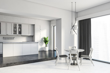 Luxury white kitchen corner with round table