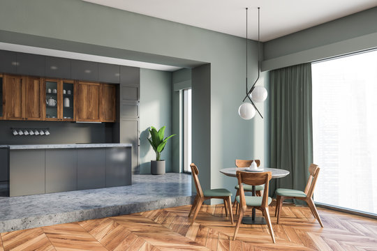 Luxury gray kitchen corner with round table