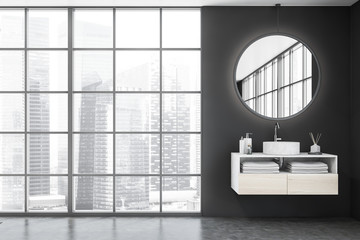 Round sink in panoramic gray bathroom