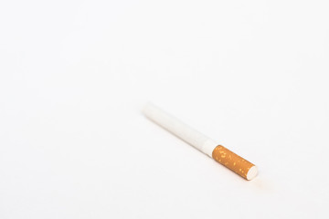 Cigarette on a light background.