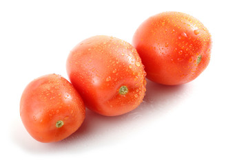 Three red tomatoes