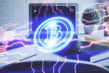 Multi exposure of blockchain and crypto economy theme hologram and table with computer background....