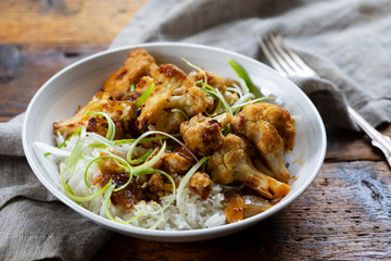 Roast cauliflower with adobo sauce and rice