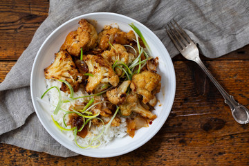 Roast cauliflower with adobo sauce and rice