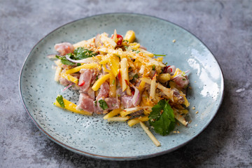 Tuna ceviche with coconut milk, mango, chilli and lime juice