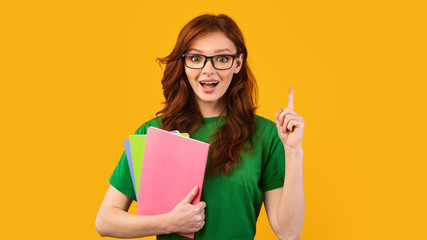 Geek Student Girl Having Idea Standing On Yellow Background, Panorama - obrazy, fototapety, plakaty