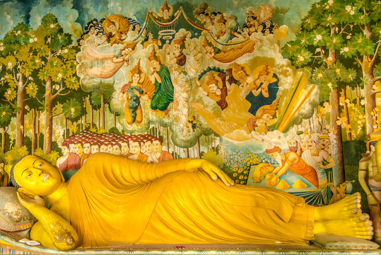 Buddha statue and painting in Buddhist temple Wewurukannala Vihara near Dikwella - Sri Lanka