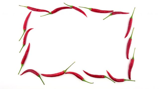 Stop motion, Chilli Peppers on white background.