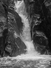 Amazing waterfall on a winter rainy morning in Peneda Geres National Park, Portugal - black and white