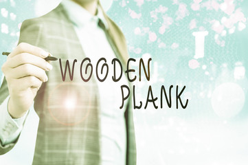 Conceptual hand writing showing Wooden Plank. Concept meaning wood or similar material of the type...
