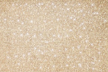 brilliant texture, glitter on a gold background, glitter on a gold texture, light background with glitter