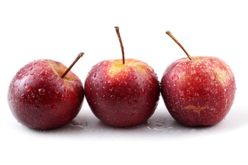 Three red apples