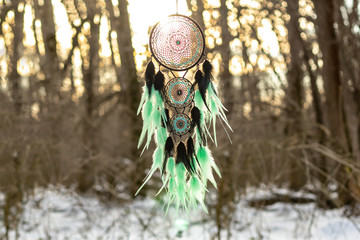 Handmade dream catcher with feathers threads and beads rope hanging