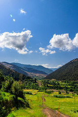 Beautiful and peaceful field with river and trees and mountains. amazing nature and landscape of Iran a country in Middle East
