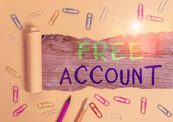 Writing note showing Free Account. Business concept for signing up demonstratingal information or...