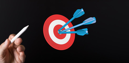 Dart arrow on target dartboard, Business success concept..