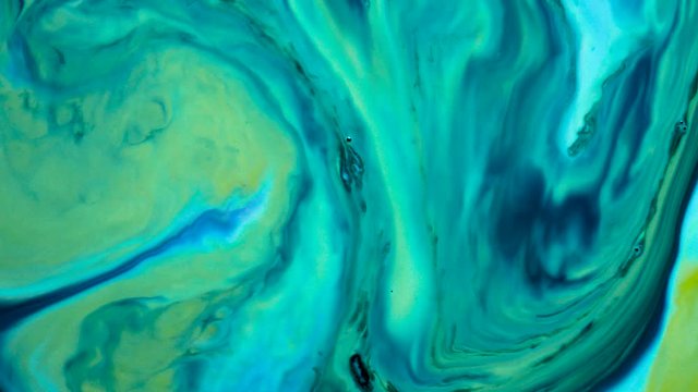 Marbling, multi-colored swirled, stone-like patterns. Paint floating, spreading on the surface of a liquid. Abstract fluid art, ink in motion. Magical marble texture. Ink bloom, blast, paint explosion