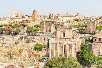 a view over the city of Rome, the Roman Forum and the Temple of Antoninus and Faustina in the foreground, Rome, Lazio, Italy