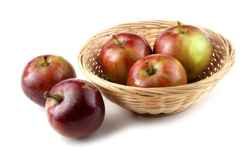 Apples on wicker plate