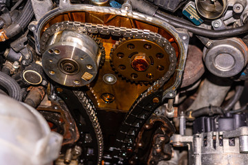 Close-up of drive camshaft circuit on turbocharged gasoline engine during scheduled maintenance