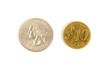 a quarter dollar and dime on a white background. isolate. to close