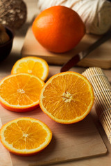 Sliced orange slices. Round orange slices on the table