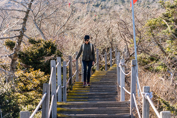 Person Hiking on Hallasan Mountain on Jeju Island