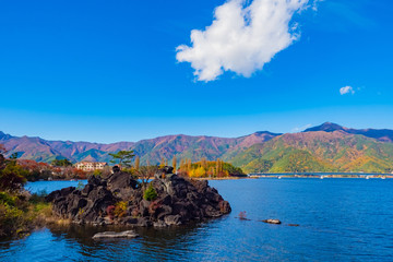 Japan. Kawaguchiko Lake. Journey through the five lakes of Fuji. Volcanic stones off the coast. Kawaguchiko lake in sunny weather. Vacations in Fyuzhikavaguchiko. Nature of Yagizaki Park. Landscape