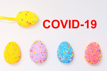 Easter eggs wearing a medical to protect against coronavirus.